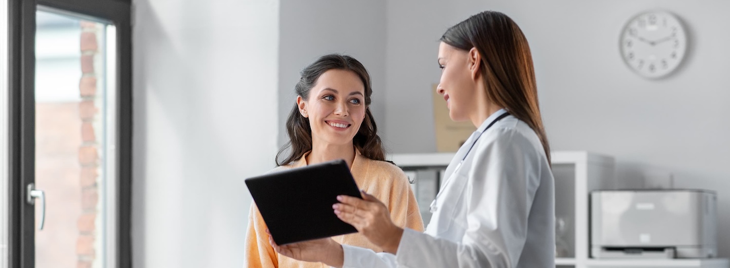 doctor helping patient